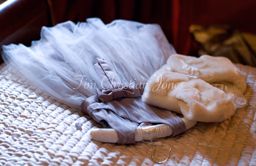 Bridesmaid dress captured in natural light at a rustic Yorkshire wedding venue by Tim Christian Jones
