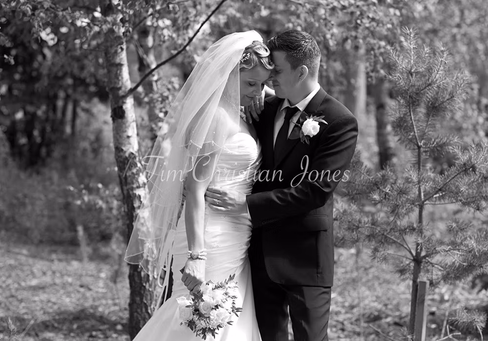 Sam and Tim share a relaxed couple portrait by the wooded grounds at the (KP Club) Kilnwick Percy Resort, full of warmth and personality.