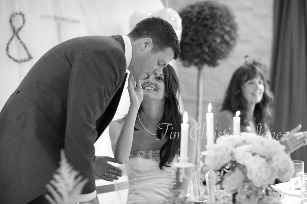 Lowri gently touches Tim’s face during his speech